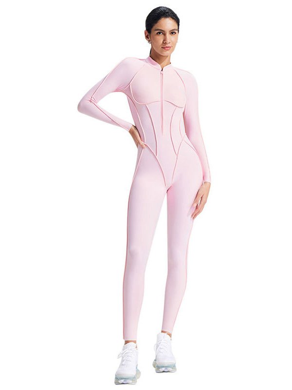 Light pink one-piece bodysuit with a zip-up front and a body-contouring design, ideal for athletic or casual wear.