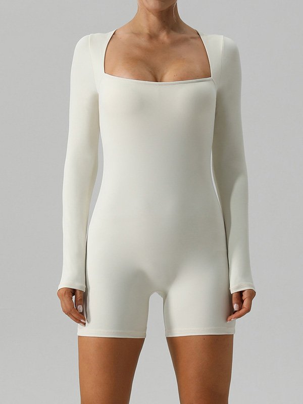 Light blue ribbed one-piece bodysuit with long sleeves and buttons, offering both comfort and chic style