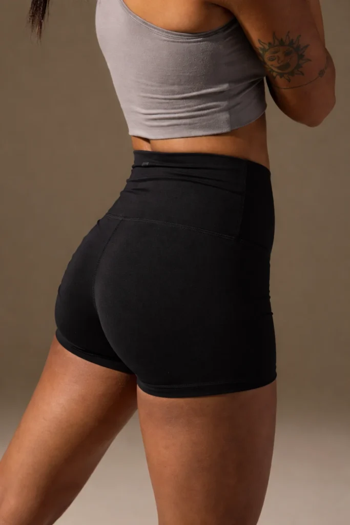 These high-waist yoga shorts feature a smooth, compressive fit with contour seams that enhance shape and support movement. Ideal for yoga, training, and athleisure wear, offering comfort, flexibility, and a clean silhouette.